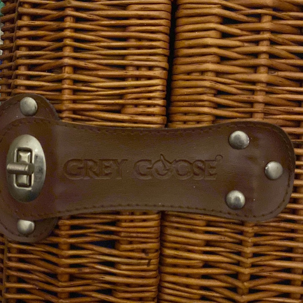 Grey Goose wine/bottle holder in leather & wicker. Great for romantic picnics!